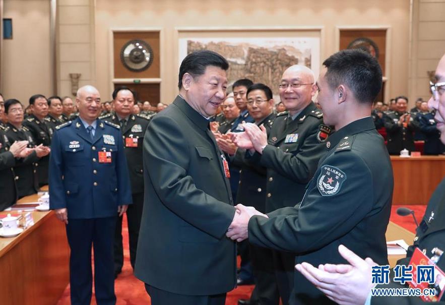  3月12日上午，中共中央總書記、國家主席、中央軍委主席習近平出席十三屆全國人大一次會議解放軍和武警部隊代表團全體會議。